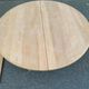 Table à manger ronde extensible décapée en merisier massif brut pied centra