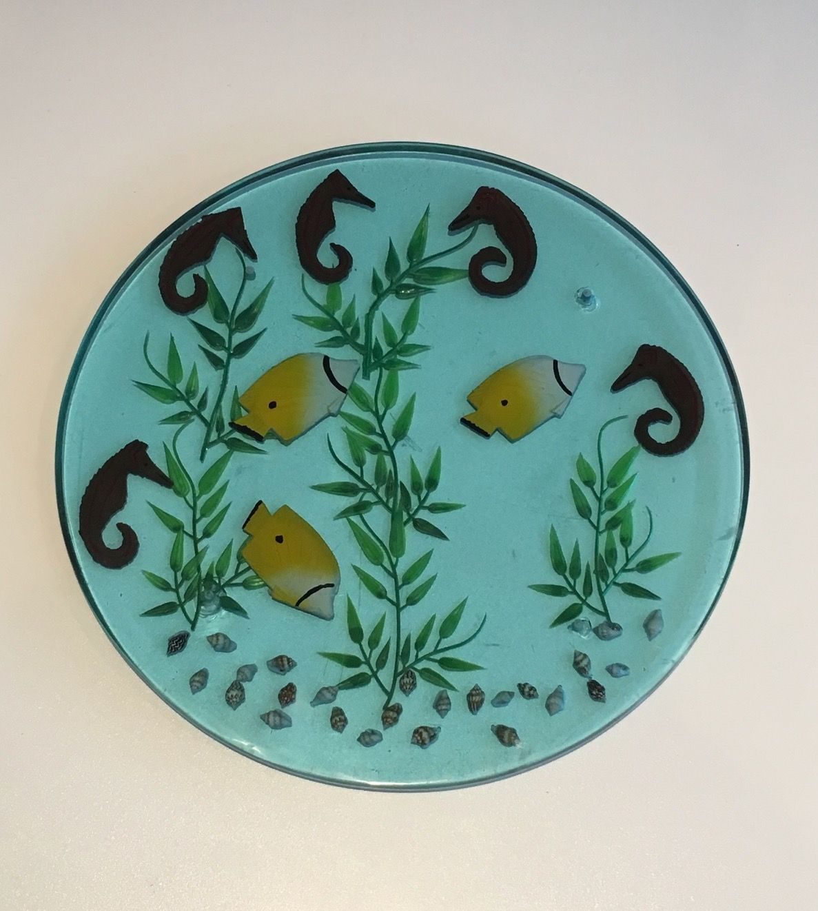 Set of 4 resin trays, inlaid with seahorses, fish, seaweed, and shells.