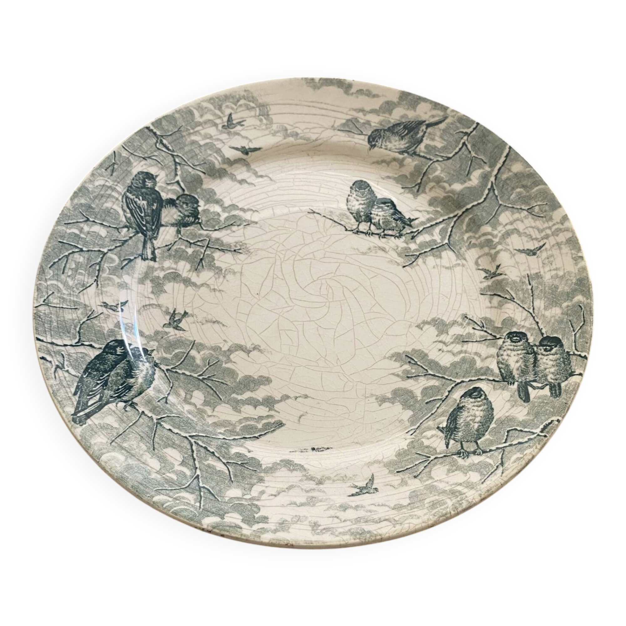 Plate on a presentation stand stamped U&C Sarreguemines Neige.