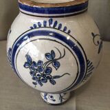 Small white decorative vase with blue floral decoration