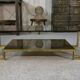 Designer coffee table with brass structure and black smoked glass, 1970s