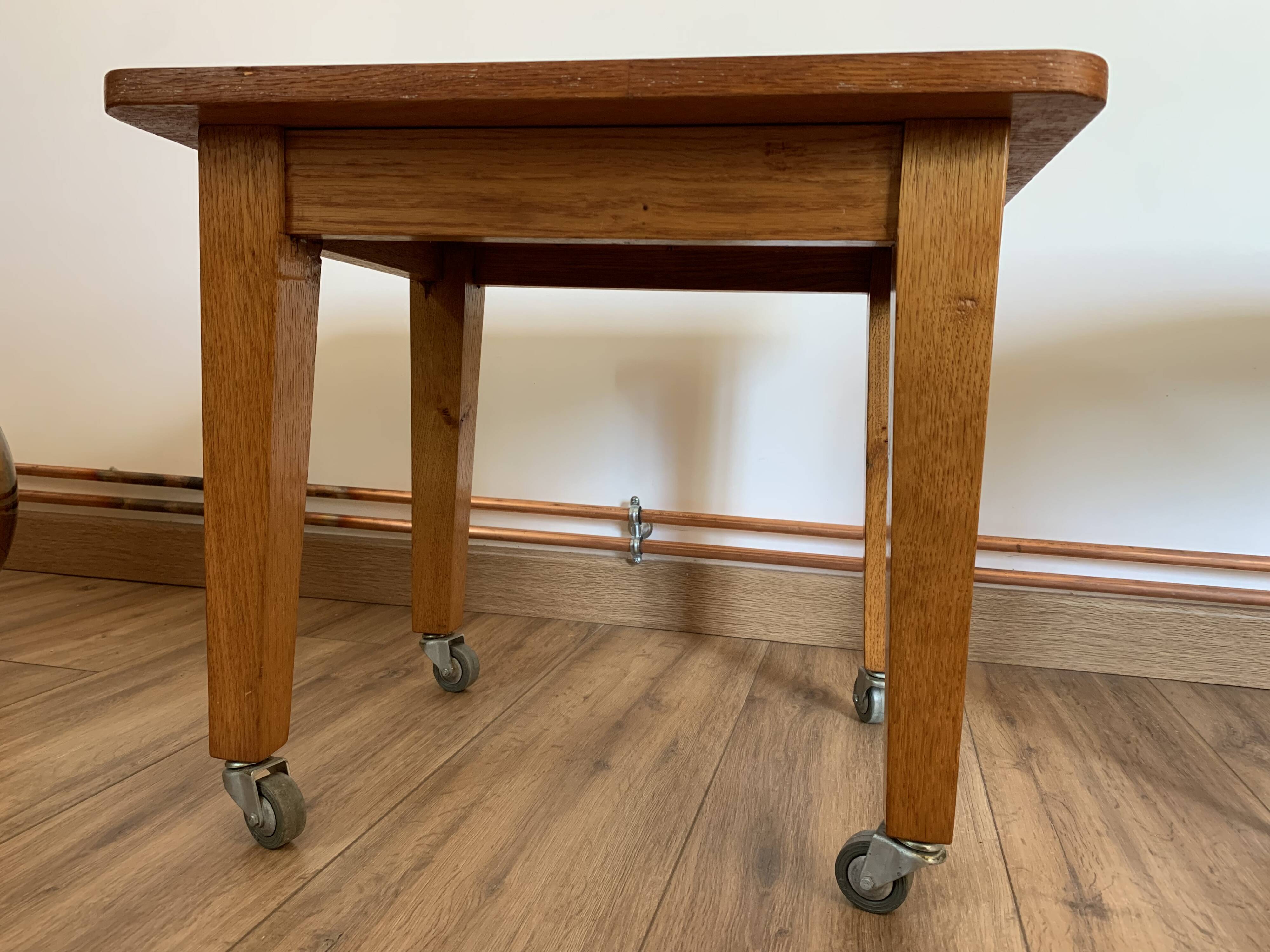 Vintage coffee table on casters