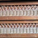 Wooden chest of drawers and vintage rattan