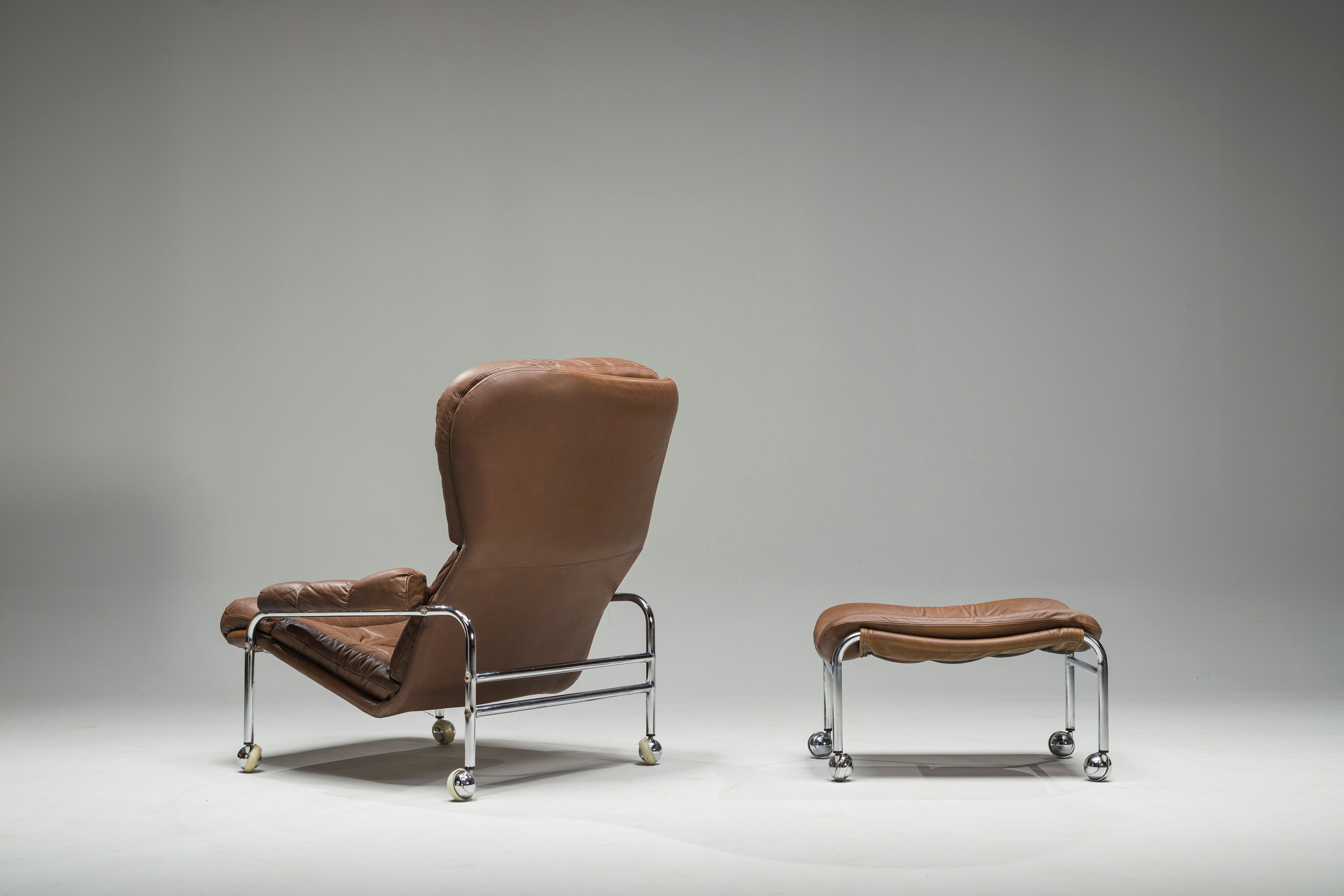 Swedish Lounge Chair and Ottoman in Chrome and Brown Leather by Scapa Rydaholm, 1960s, Set of 2