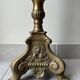 Gilded bronze candlestick with cherub trio decoration