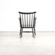 Black lacquered wooden rocking chair 70
