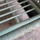 Vintage wicker lounge chair with pastel cushions – 1980s