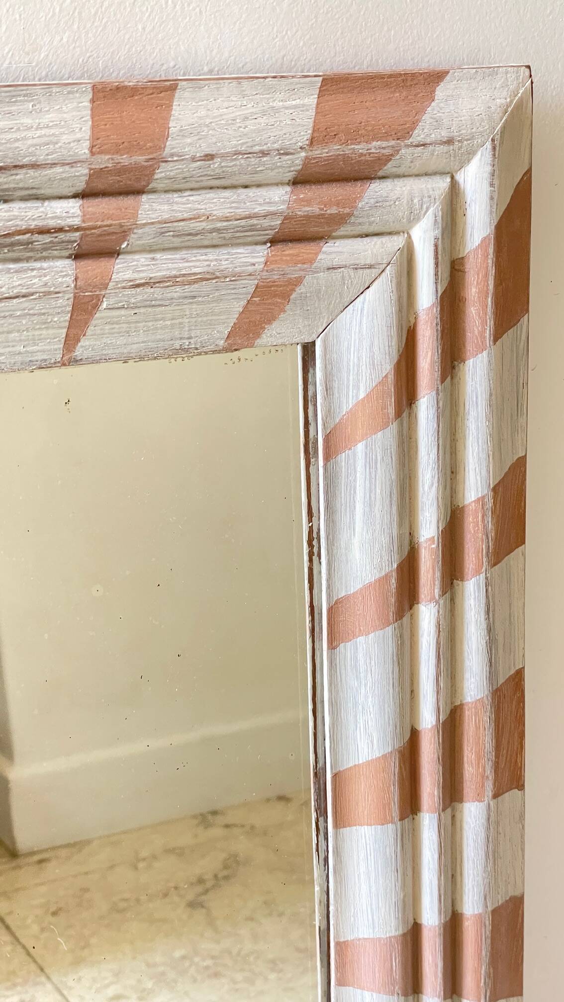 Old mirror in hand-painted wood