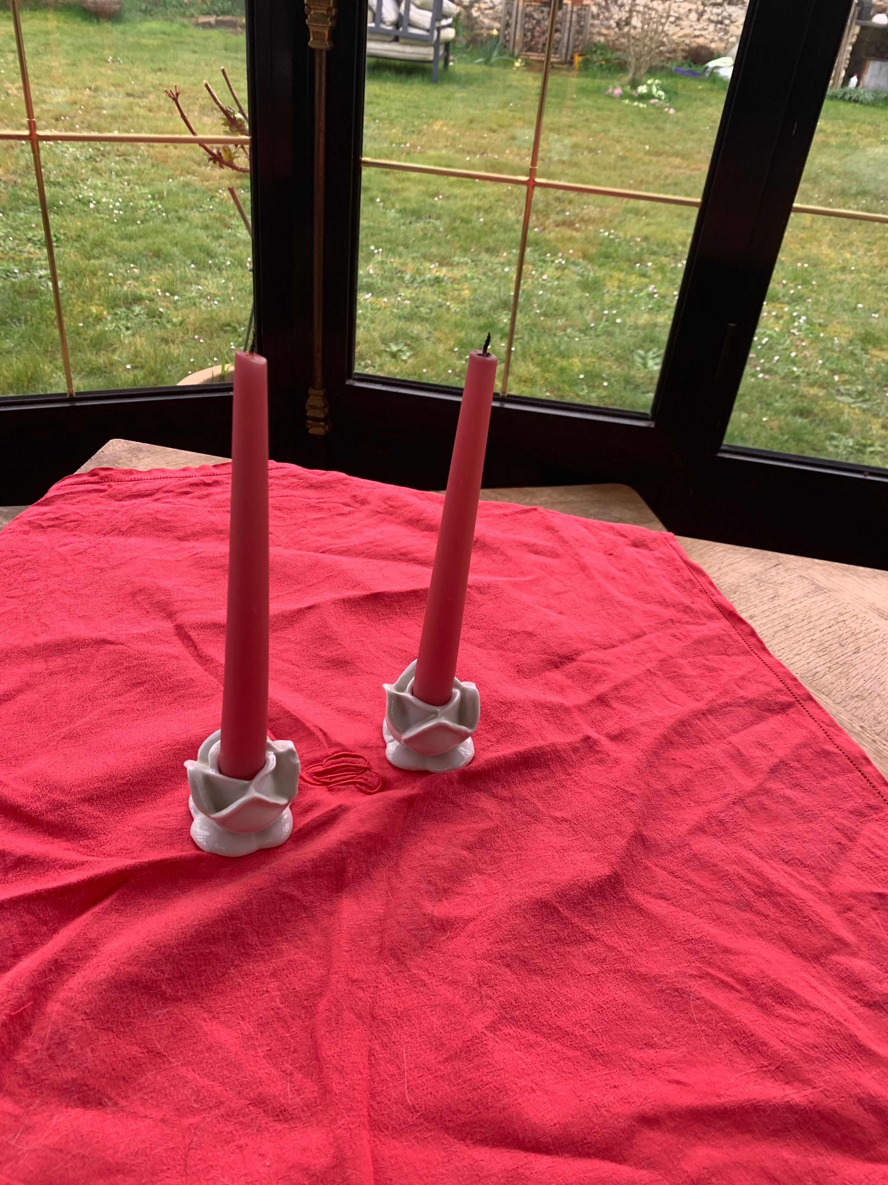 Two vintage white porcelain flower candle holders