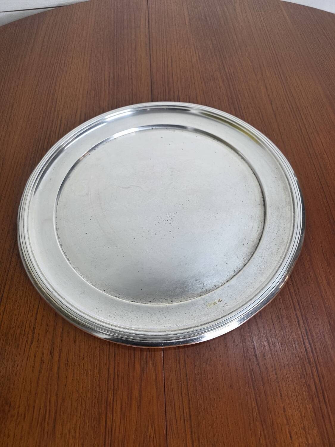 Round silver-plated metal tray from the mid-20th century