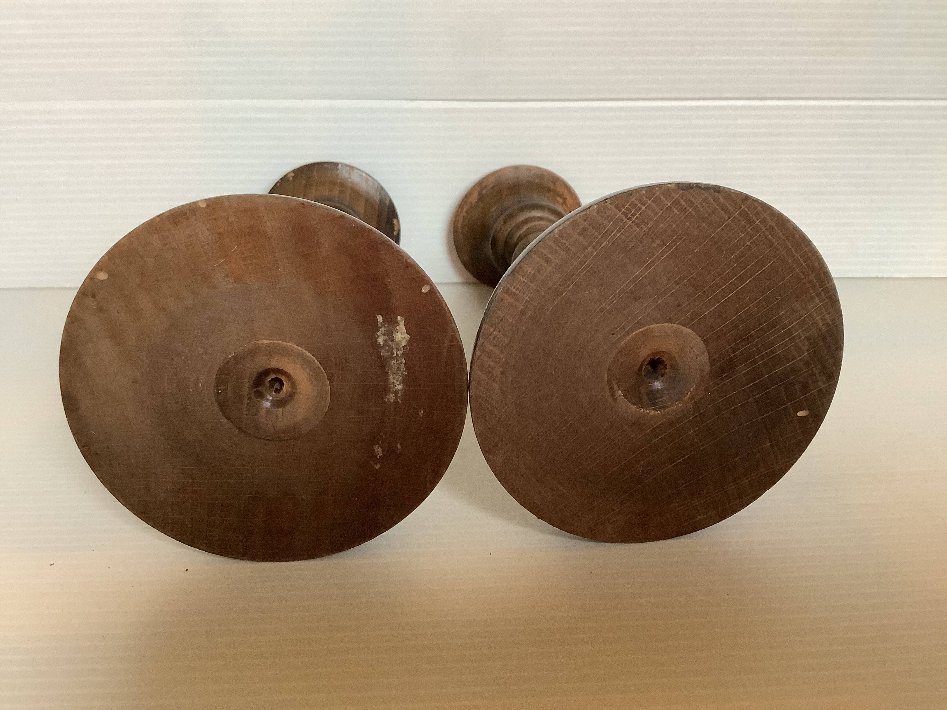 Pair of twisted turned wood candlesticks