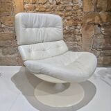 Fauteuil pivotant en cuir patiné gris