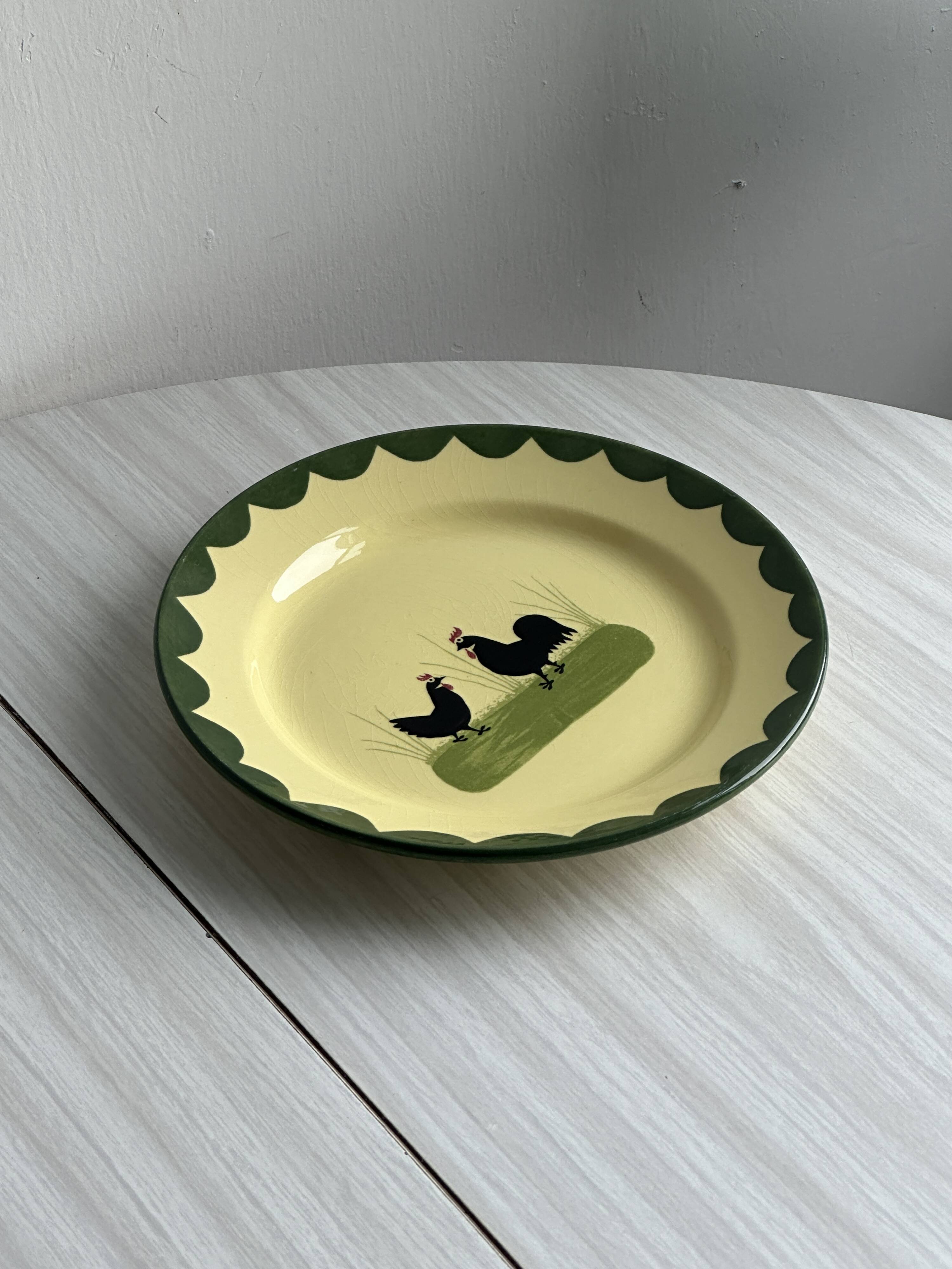 “Teller Keramik” ceramic plate with rooster motif.
