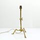 Articulated tripod lamp base in brass, Arts & Crafts style, in the manner of.