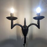 Wrought iron wall lights.