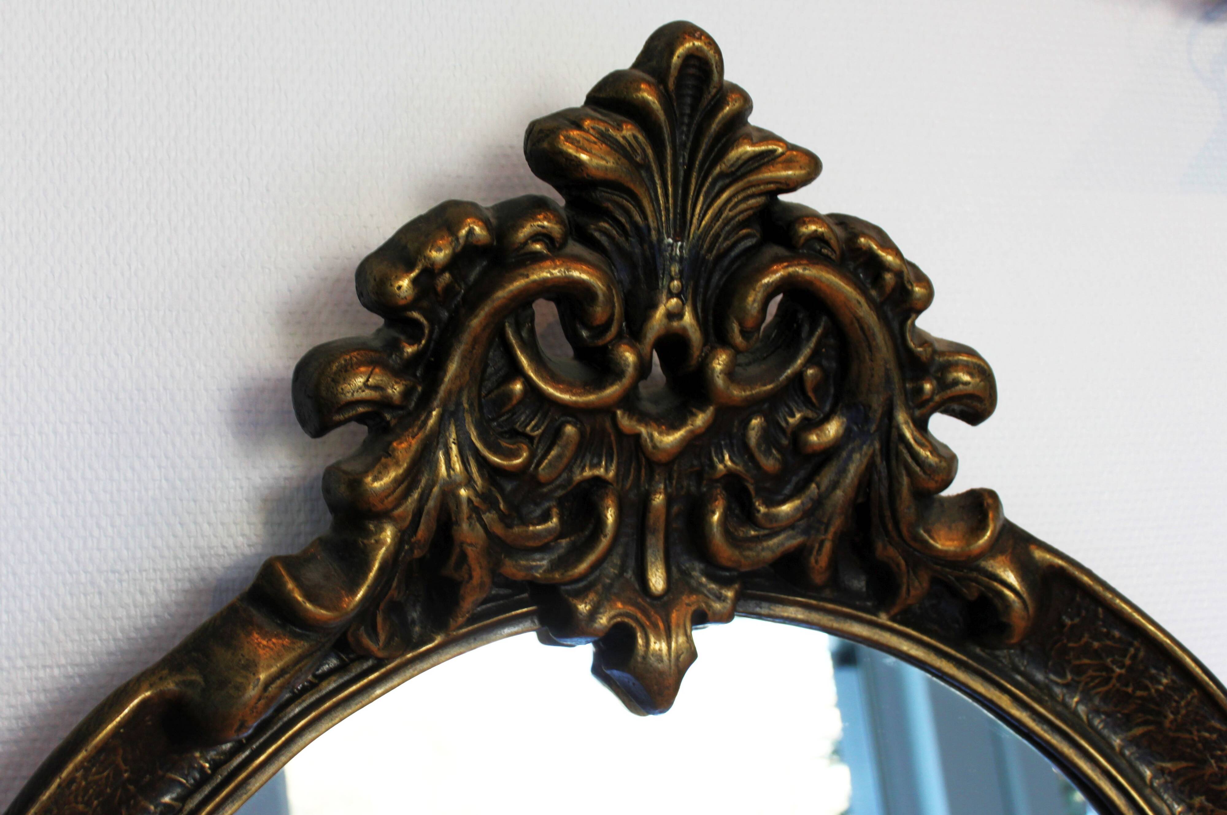 Baroque “trumeaux” mirror in carved solid wood.