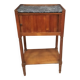 Curtained bedside table from the nineteenth century.