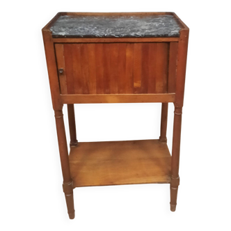 Curtained bedside table from the nineteenth century.