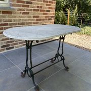 Art Nouveau cast iron and marble bistro table.