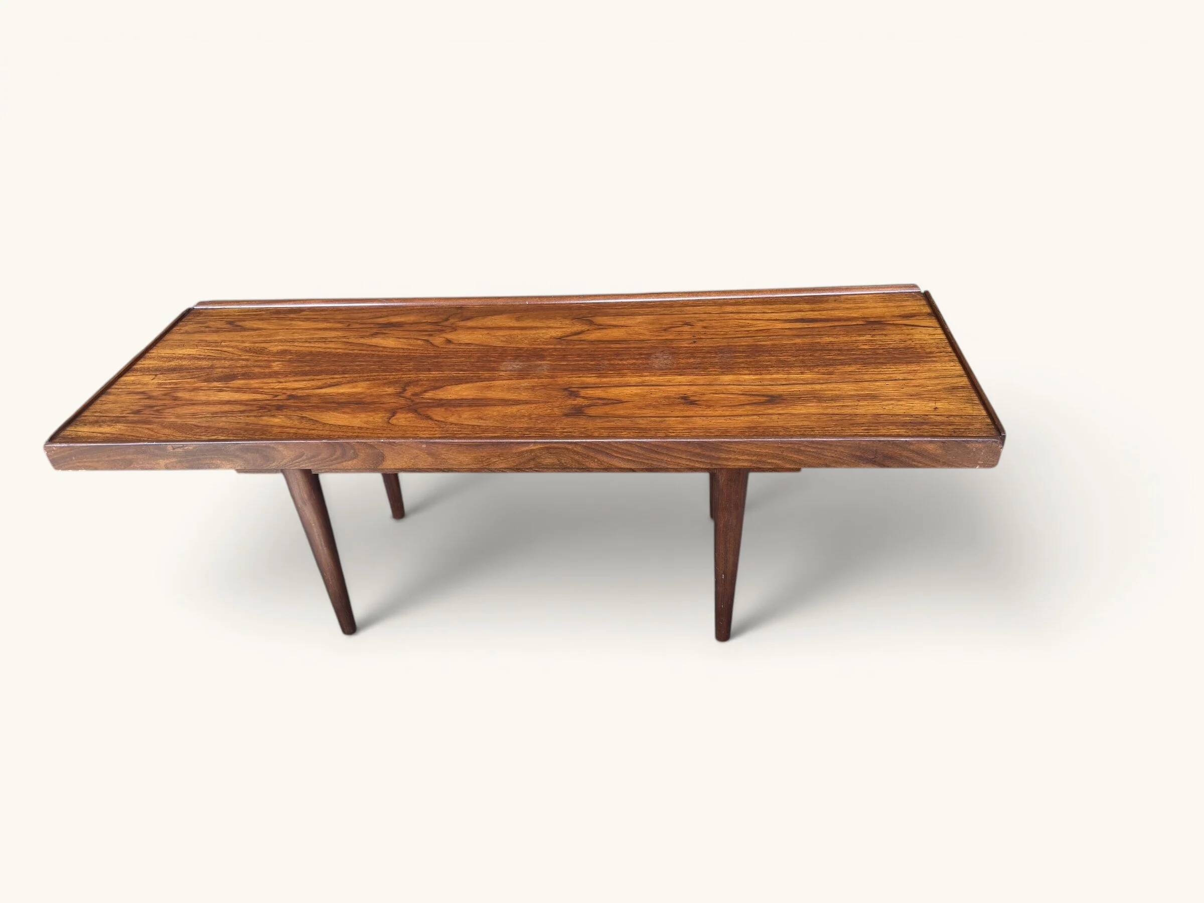 Vintage teak coffee table with a reversible top.