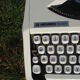 Baby hermes typewriter with manual job and his bag