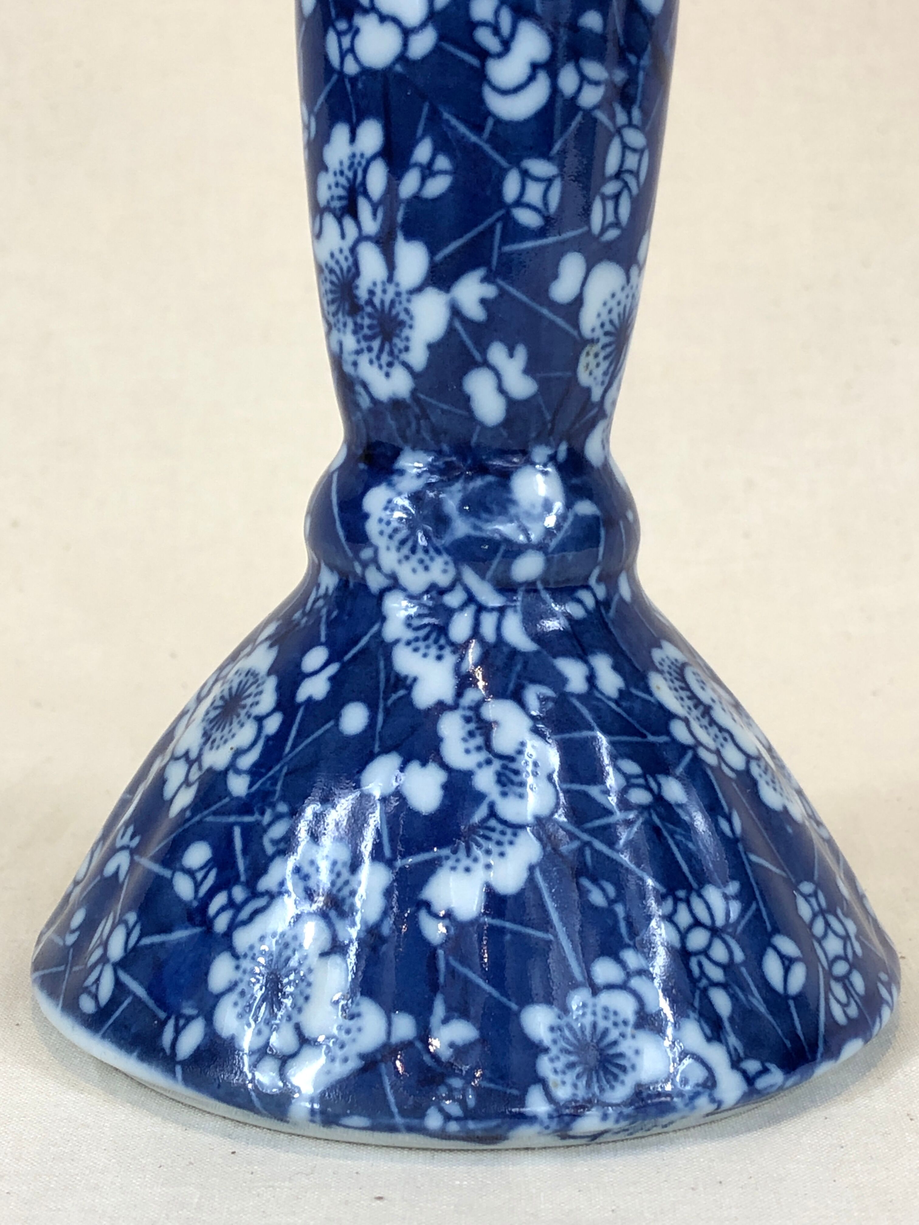 Blue ceramic candle holder pattern small white flowers