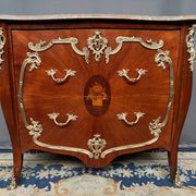 Louis XV style commode. Marquetry, gilded bronze decoration.