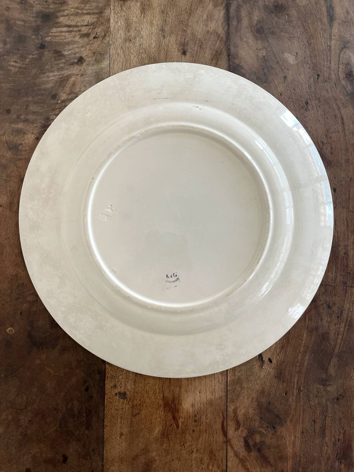 Round iron earth dish monogram “N” KG Lunéville