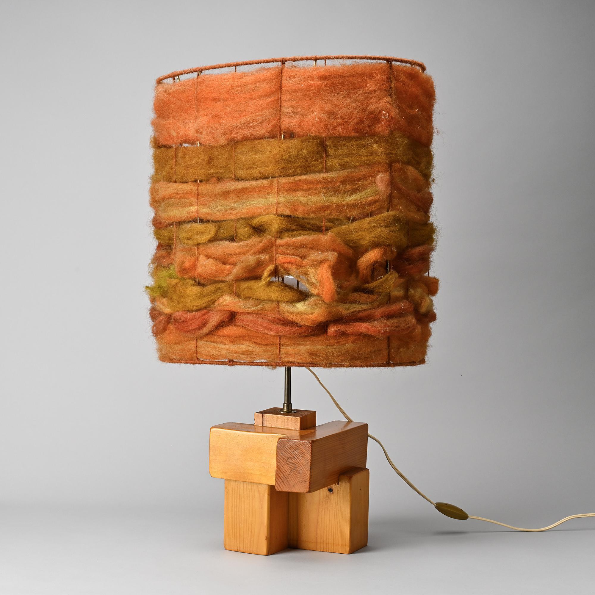 Sculptural table lamp in solid pine, France, circa 1970.