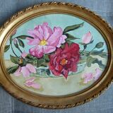 Pair of stucco frames and oil bouquets