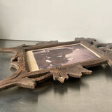 Frame in carved wood