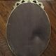Miroir ovale en bois doré 52 x 35 cm