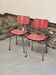 Pair of pink formica chairs