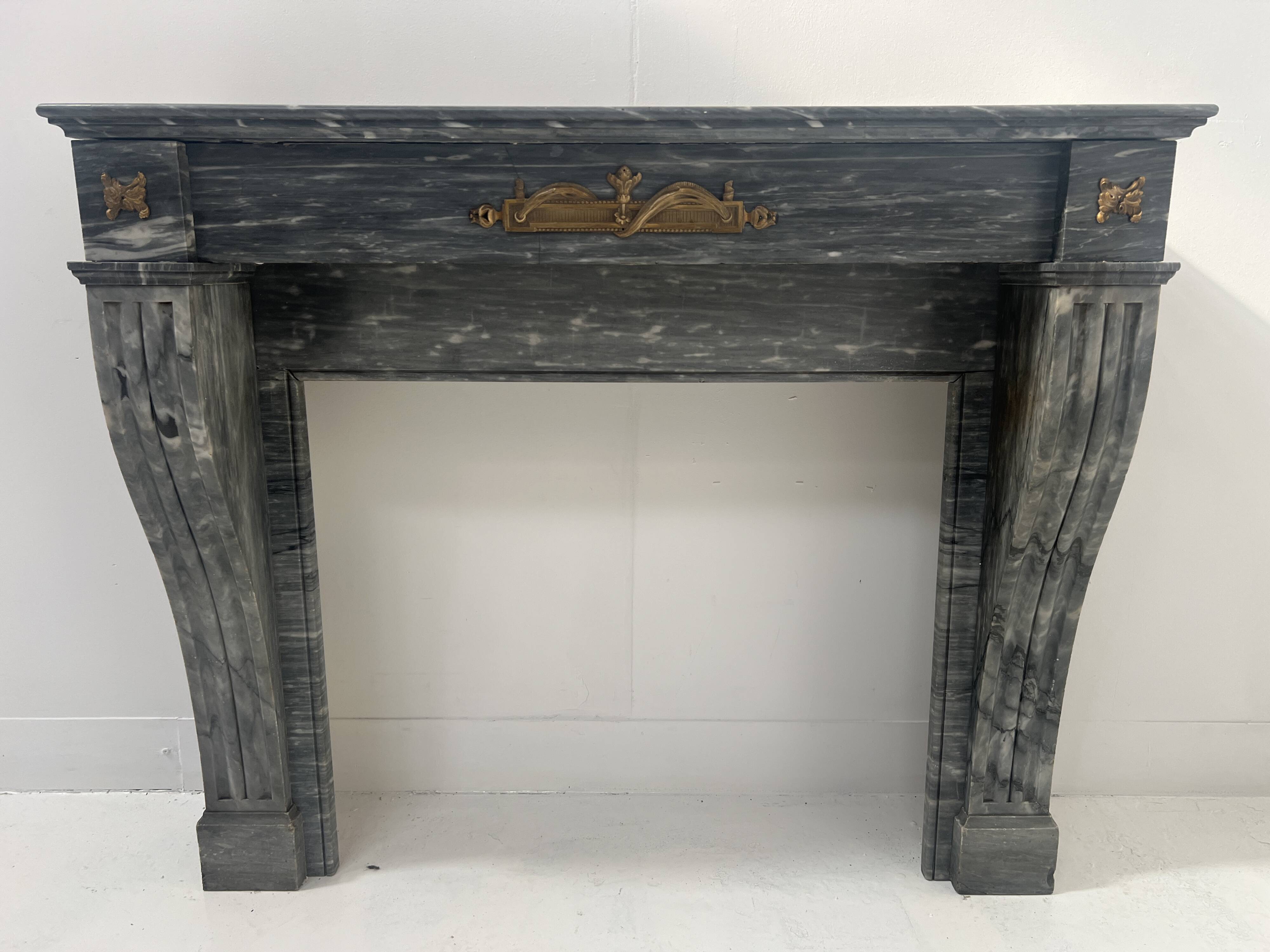 Napoleon III fireplace in blue Turquin marble from the 19th century.