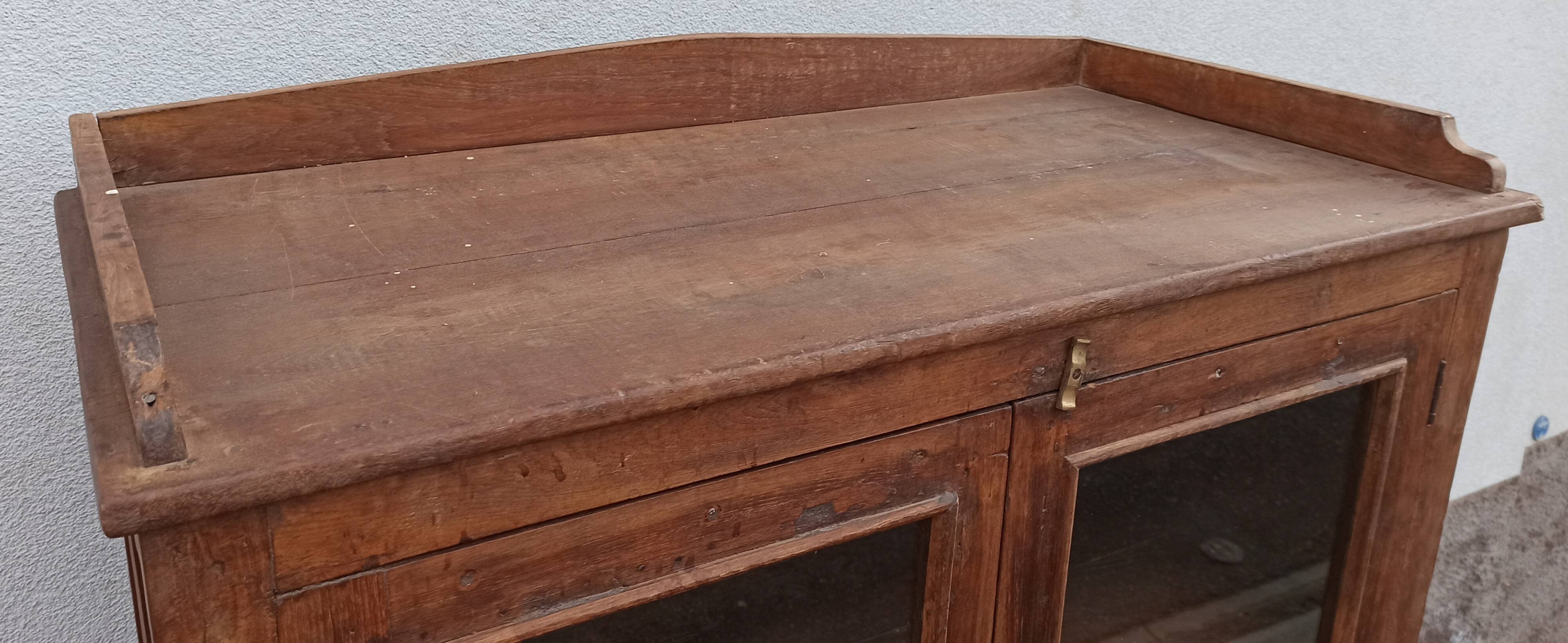 Old wooden glazed cabinet with four doors