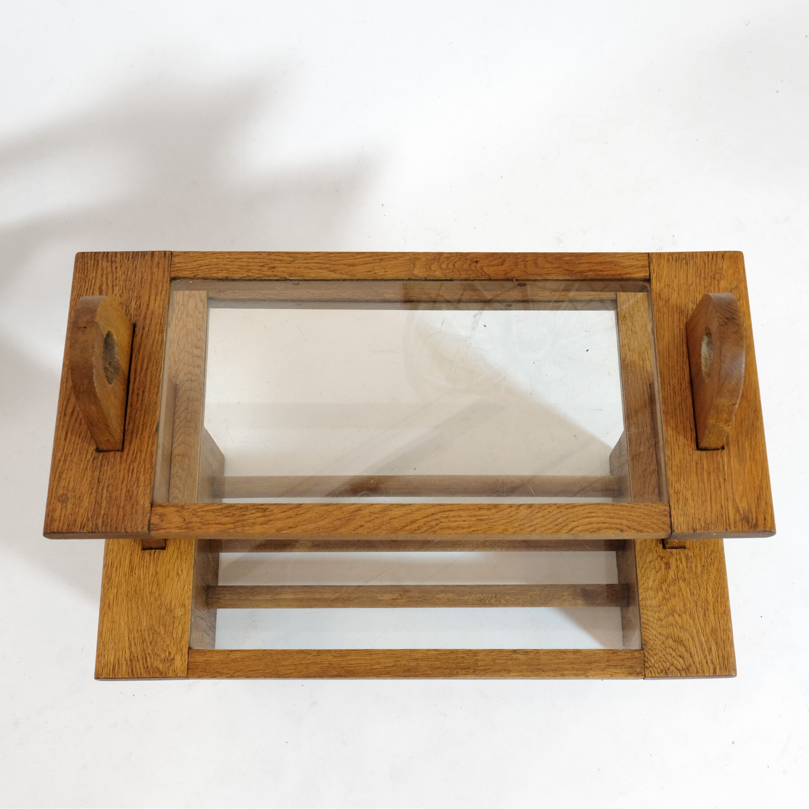 Served in oak and glass from the 50s and 60s.