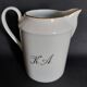 Eight-cup coffee service and creamer, Limoges porcelain, monogrammed
