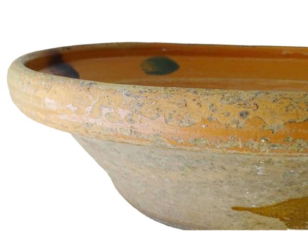 Bol ancien en faïence française à glaçure orange