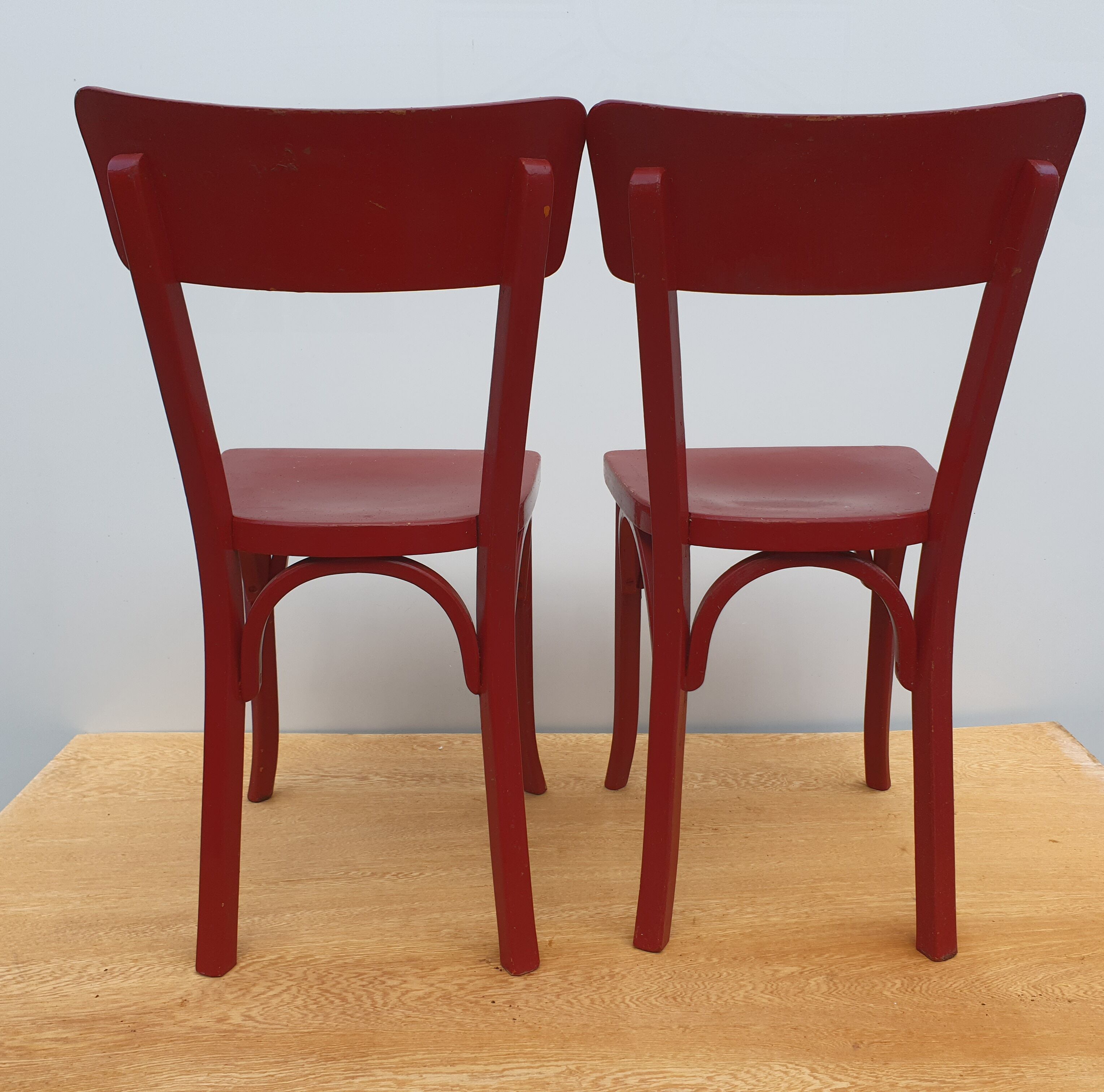 4 red chairs bistro Baumann