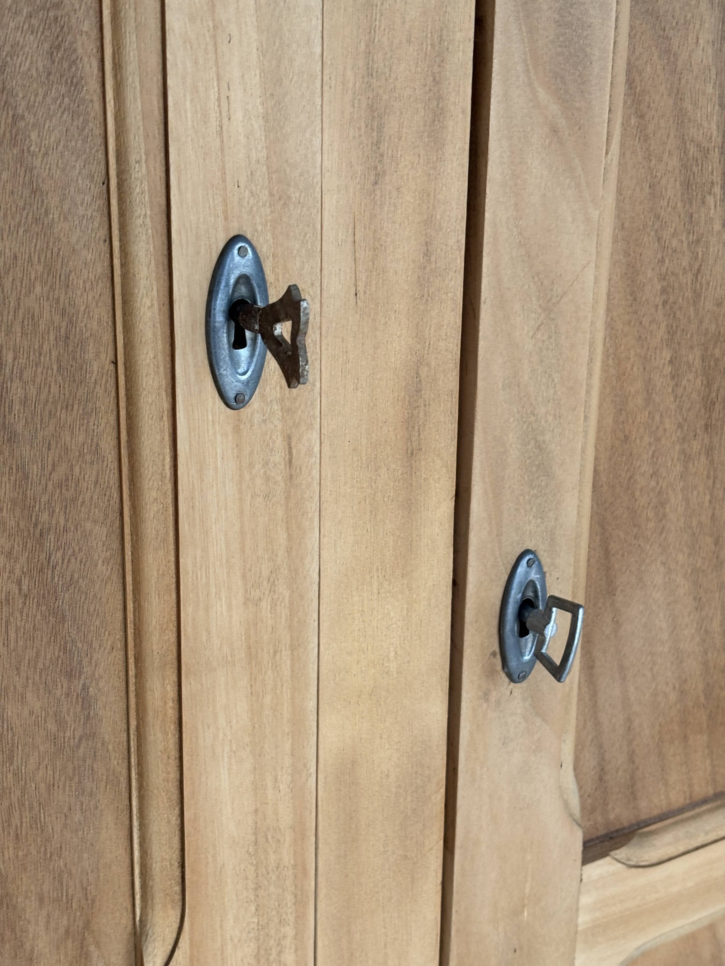 Asymmetrical Wardrobe in Raw Wood