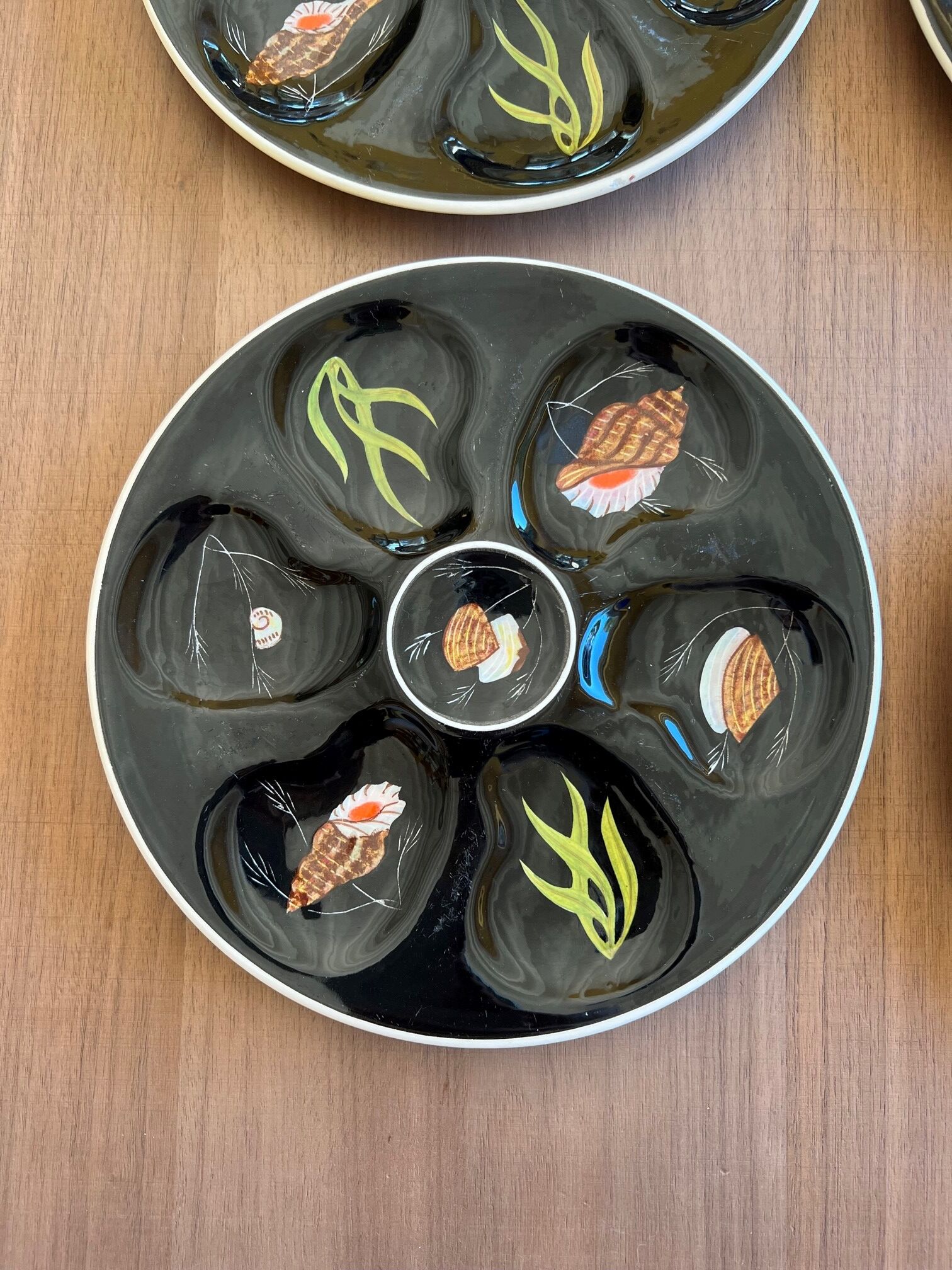 4 Henriot oyster plates