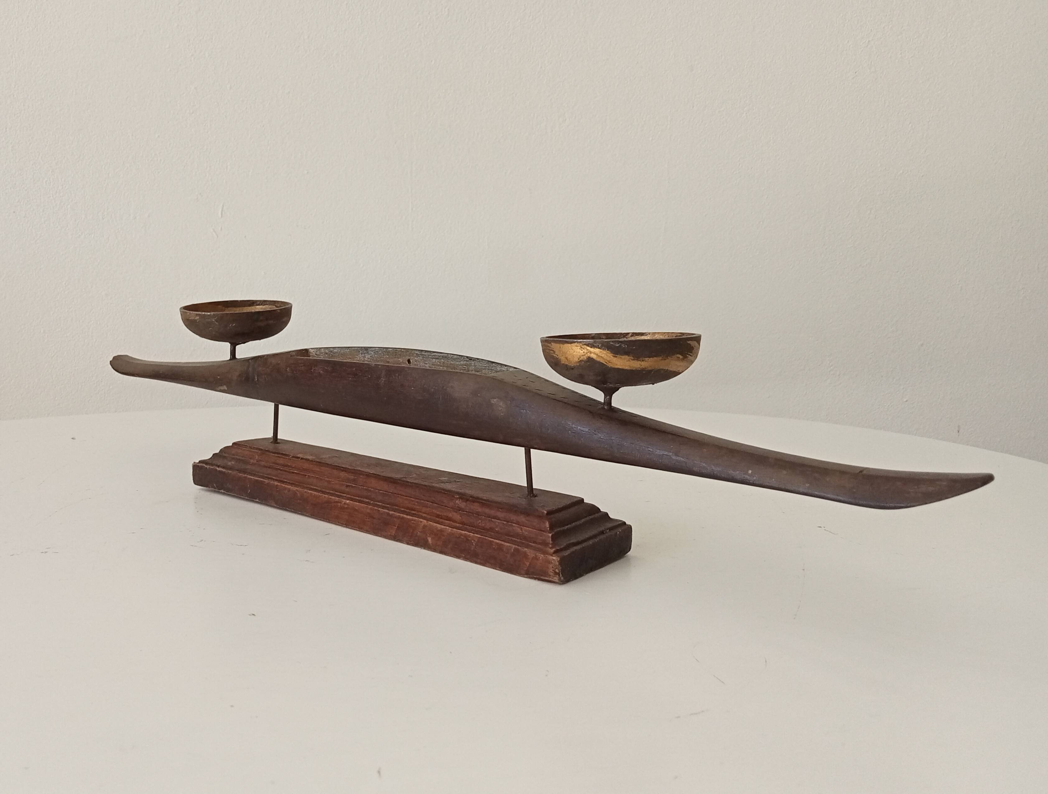 Vintage chandelier in solid carved teak.