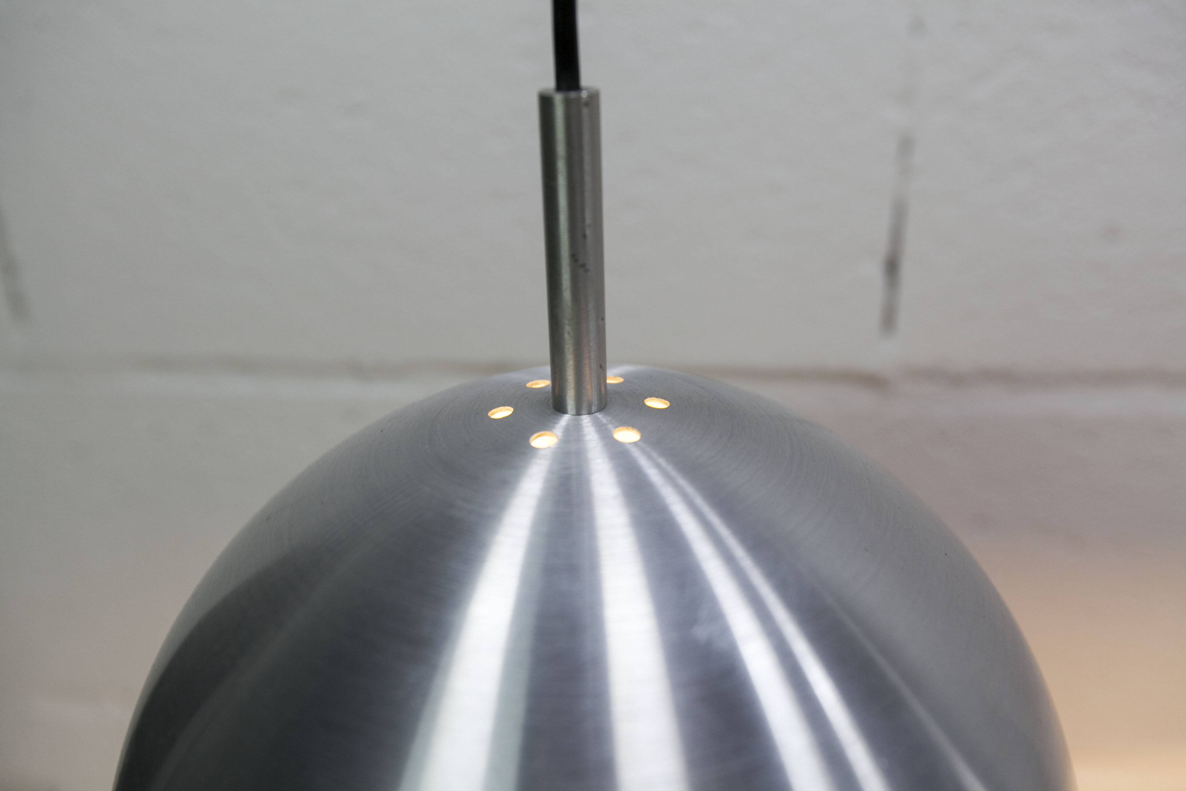 Pair of functional 70's aluminum ball pendants