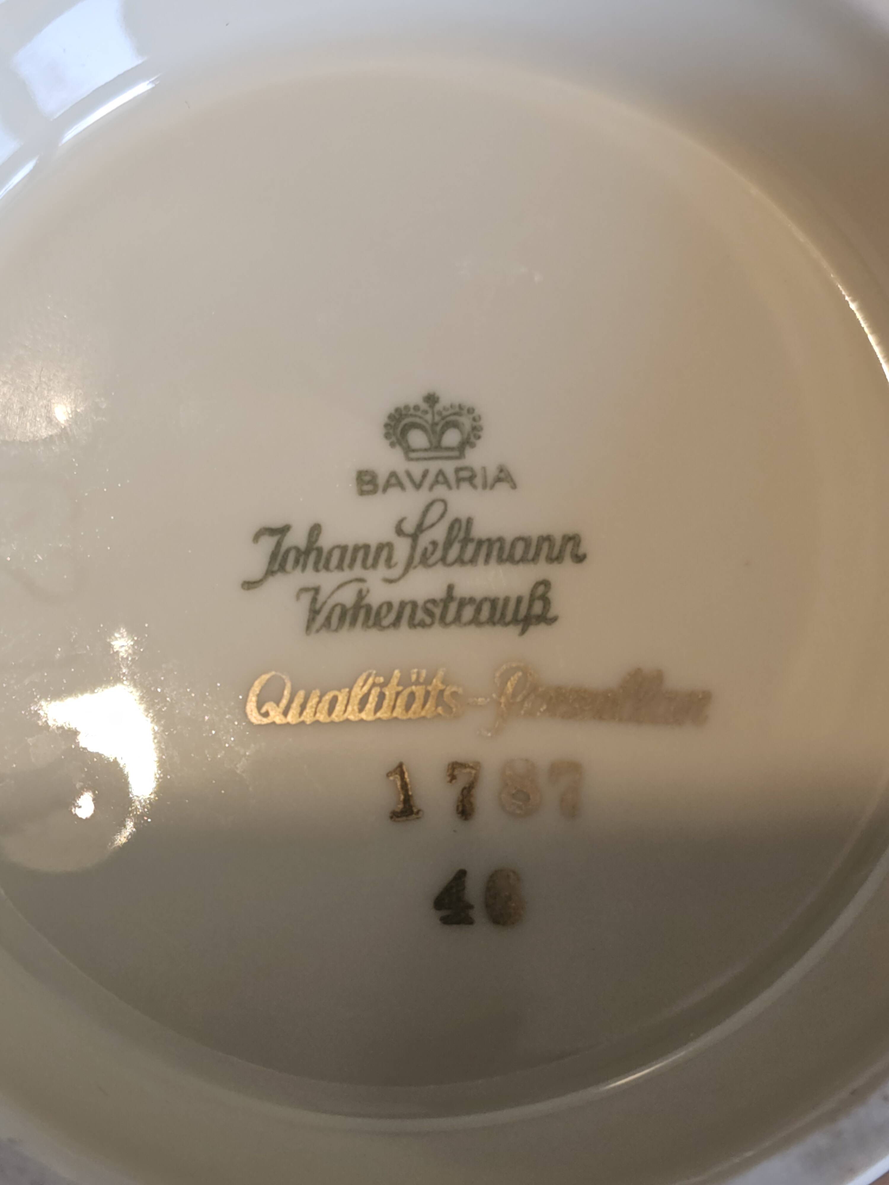 Porcelain vase with golden floral decoration by Johann Seltmann