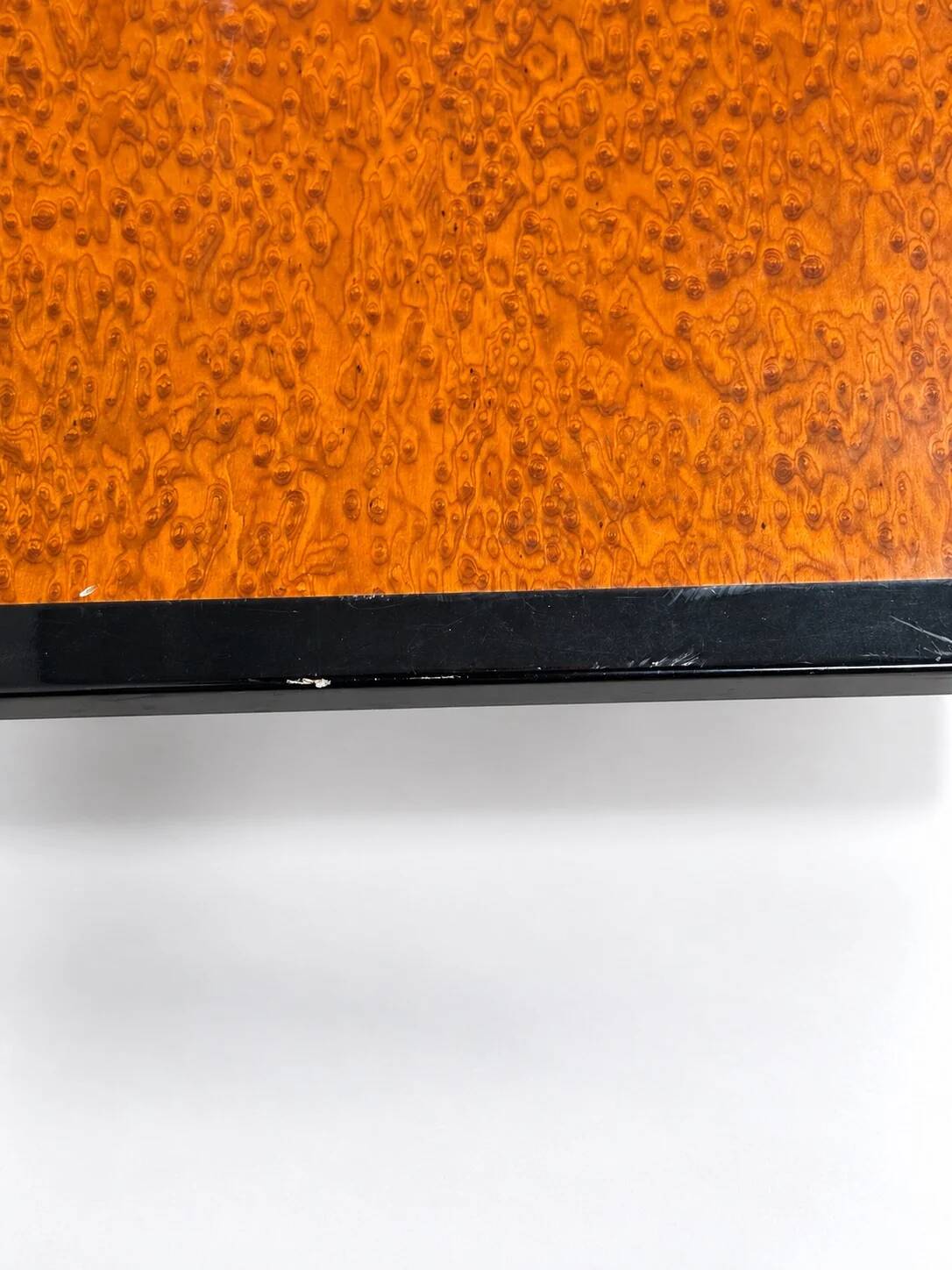 Vintage coffee table in wood burl and black lacquer, geometric inlay.