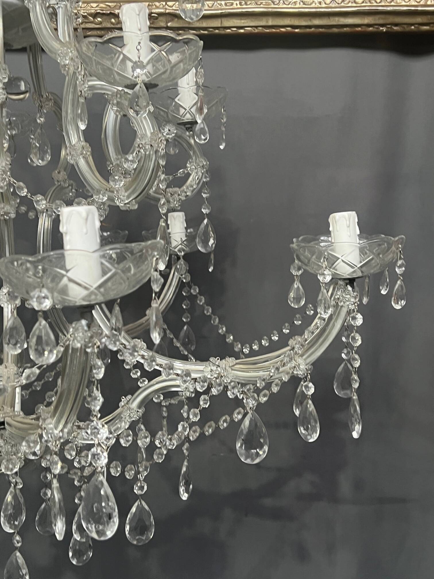 Pair of large Maria Theresa chandeliers. Crystal and glass.