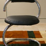 Cobra chairs in steel and black leather by Giotto Stoppino, 1970s, set of 5.