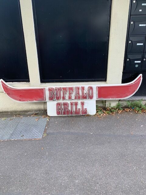 Buffalo Grill sign plate with neon