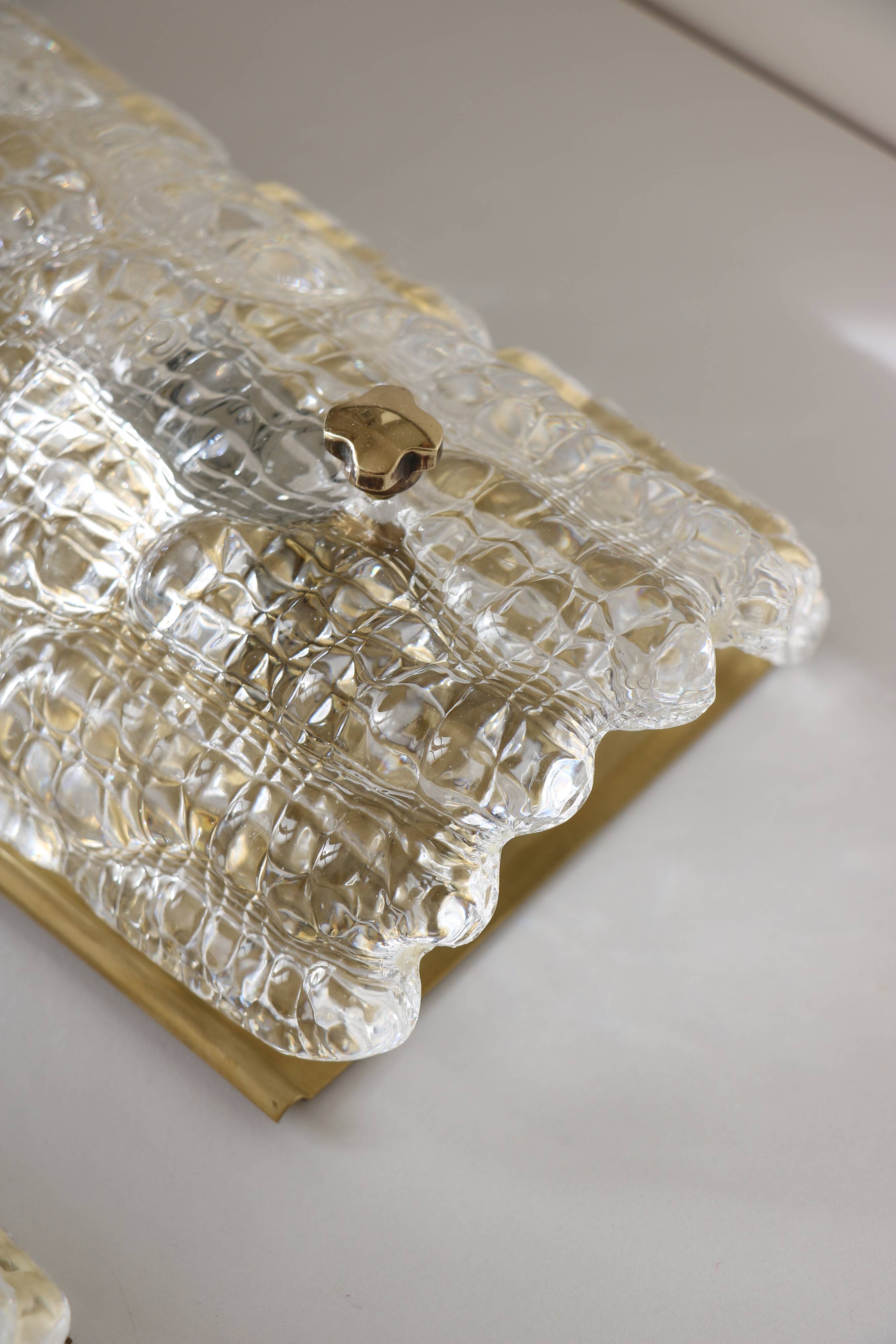 Pair of glass and brass wall lights by Carl Fagerlund for Orrefors, 1960.