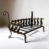 Old cast iron and brass log holder